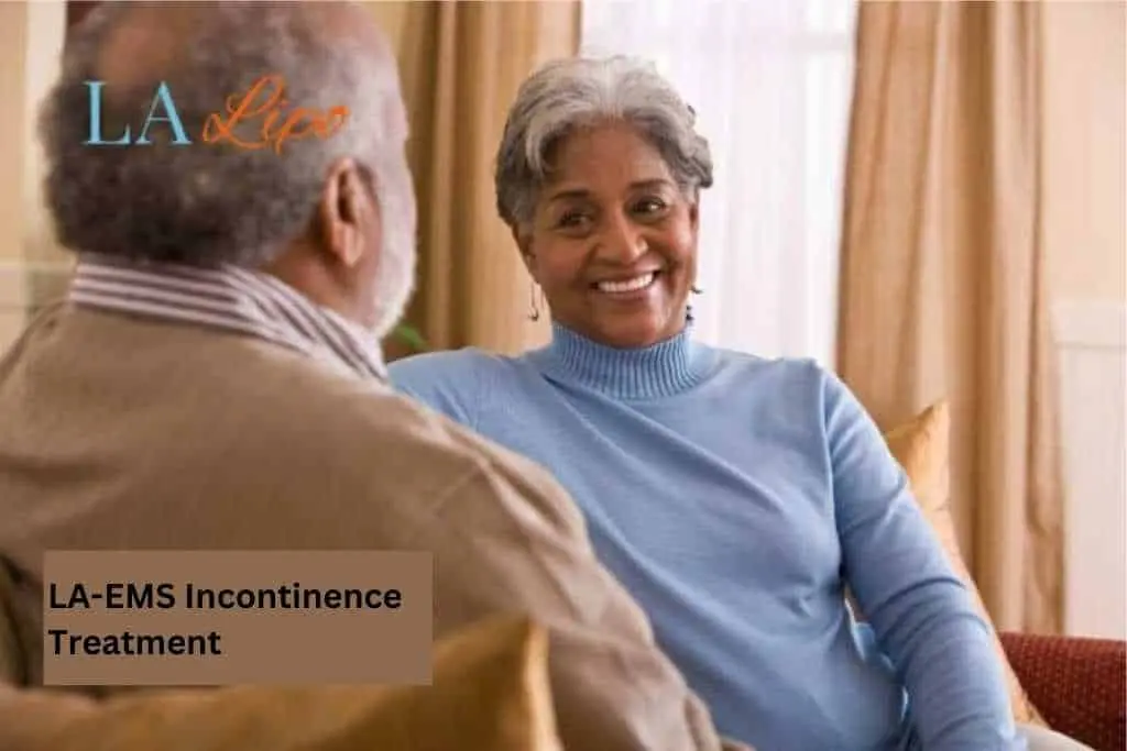 Couple sat smiling at each other - LA-EMS treatment Merton Park