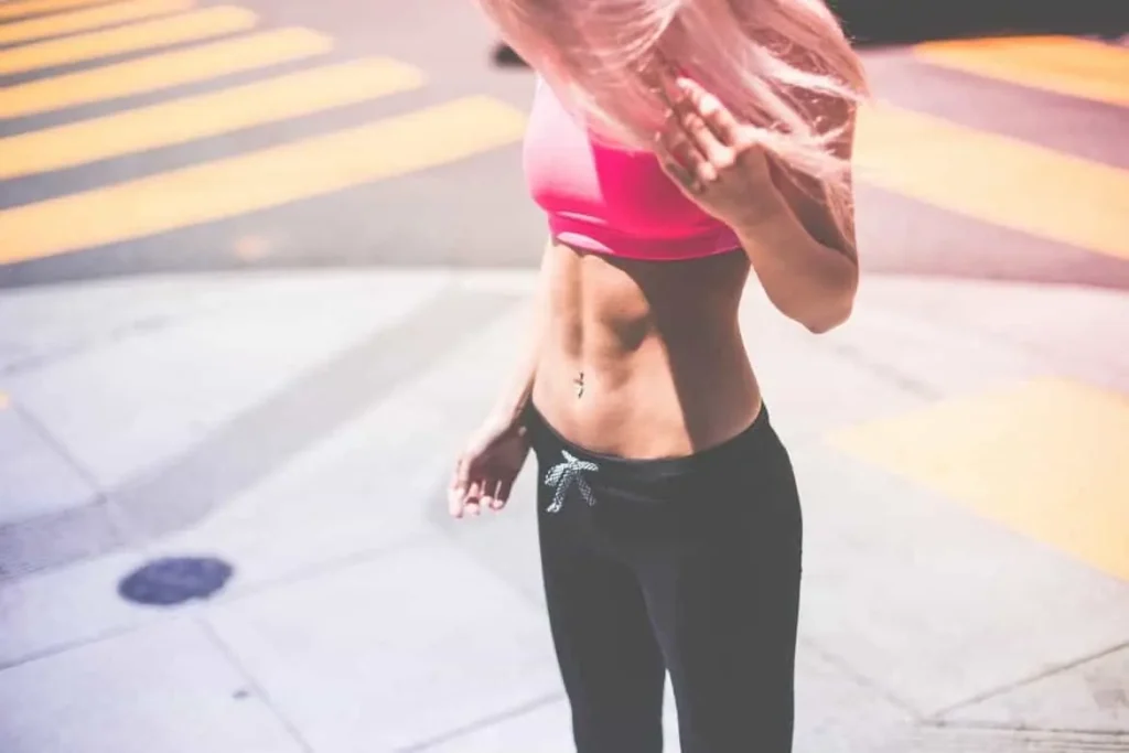 Woman with toned stomach after LA-EMS Body Sculpting Treatment Merton Park