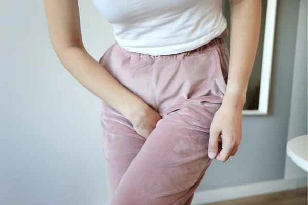 woman running for the toilet because of urinary incontinence Merton Park